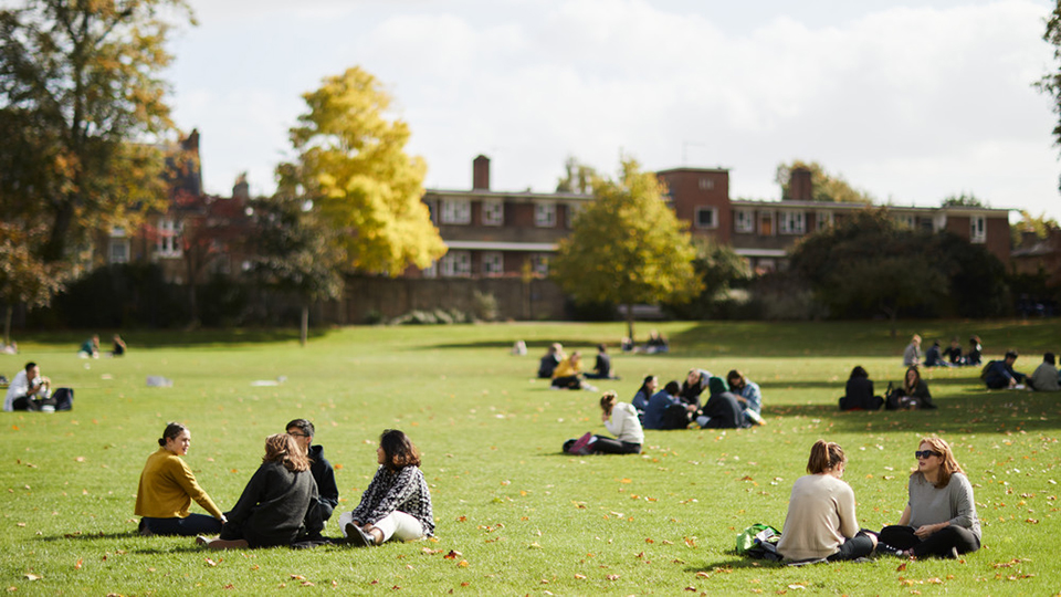 Students sitting on the green