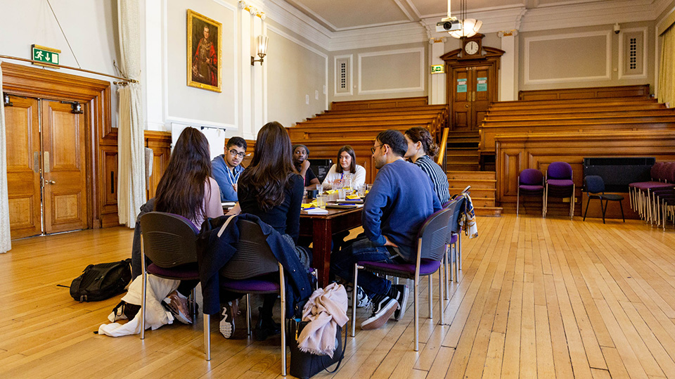 Students participating in a mock trial in the Council Chamber