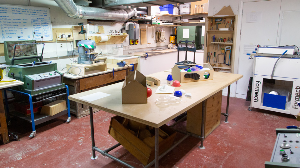 Various equipment in the woodwork lab, including a vacuformer