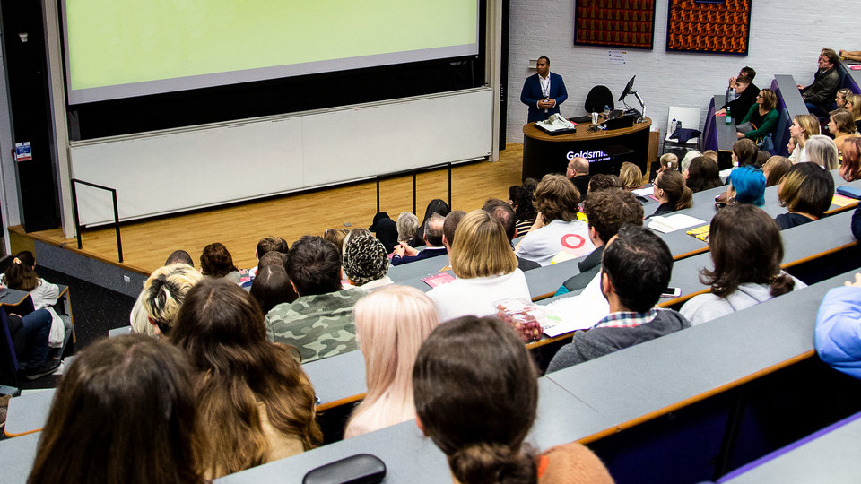 A staff meeting in the Ian Gulland Lecture Theatre