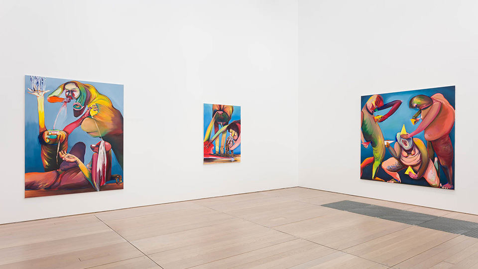 Inside the Briget Riley Gallery at the CCA, a plain room with brightly coloured abstract paintings
