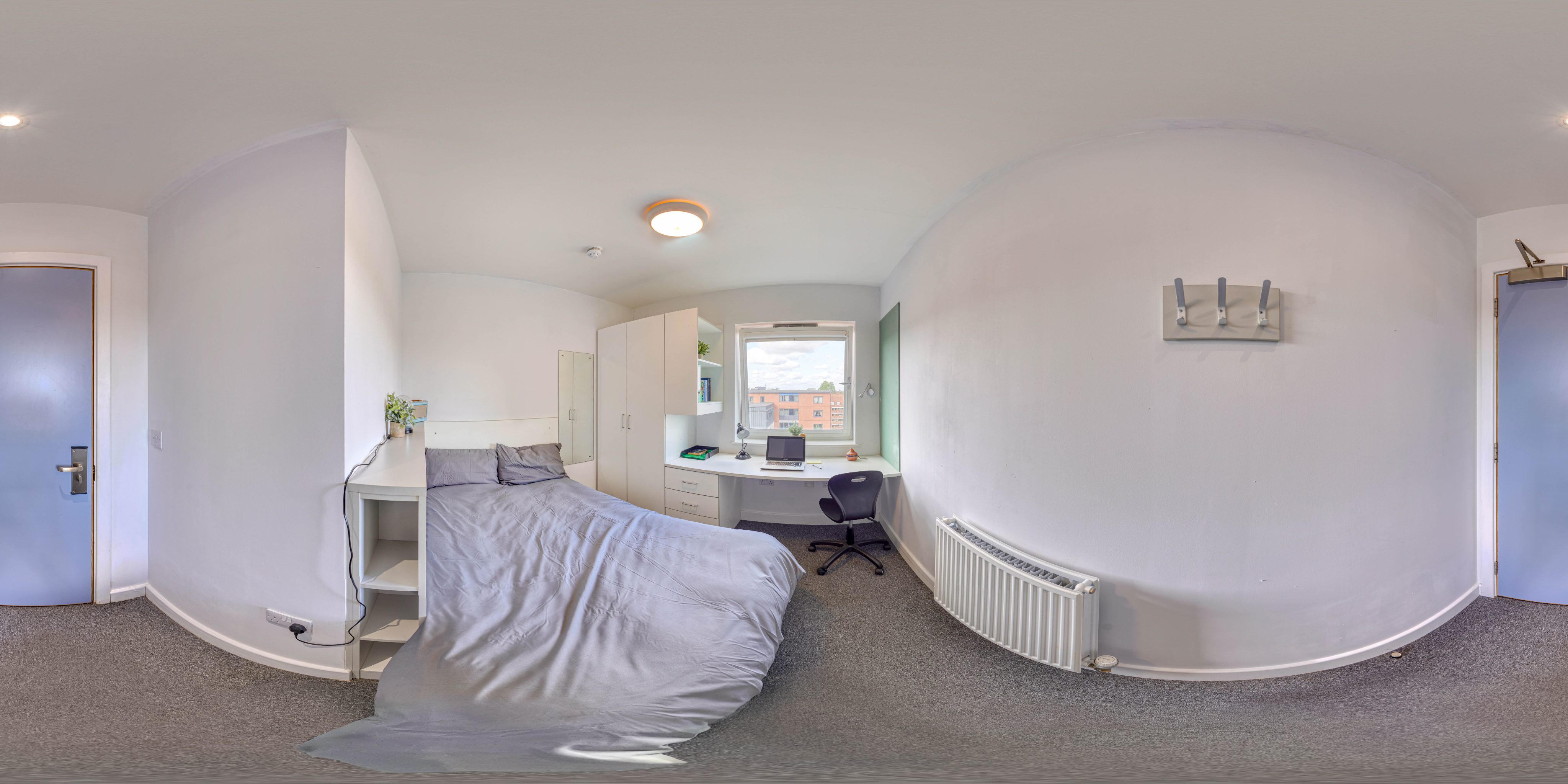 A standard bedroom with desk and wardrobe in Town Hall Camberwell
