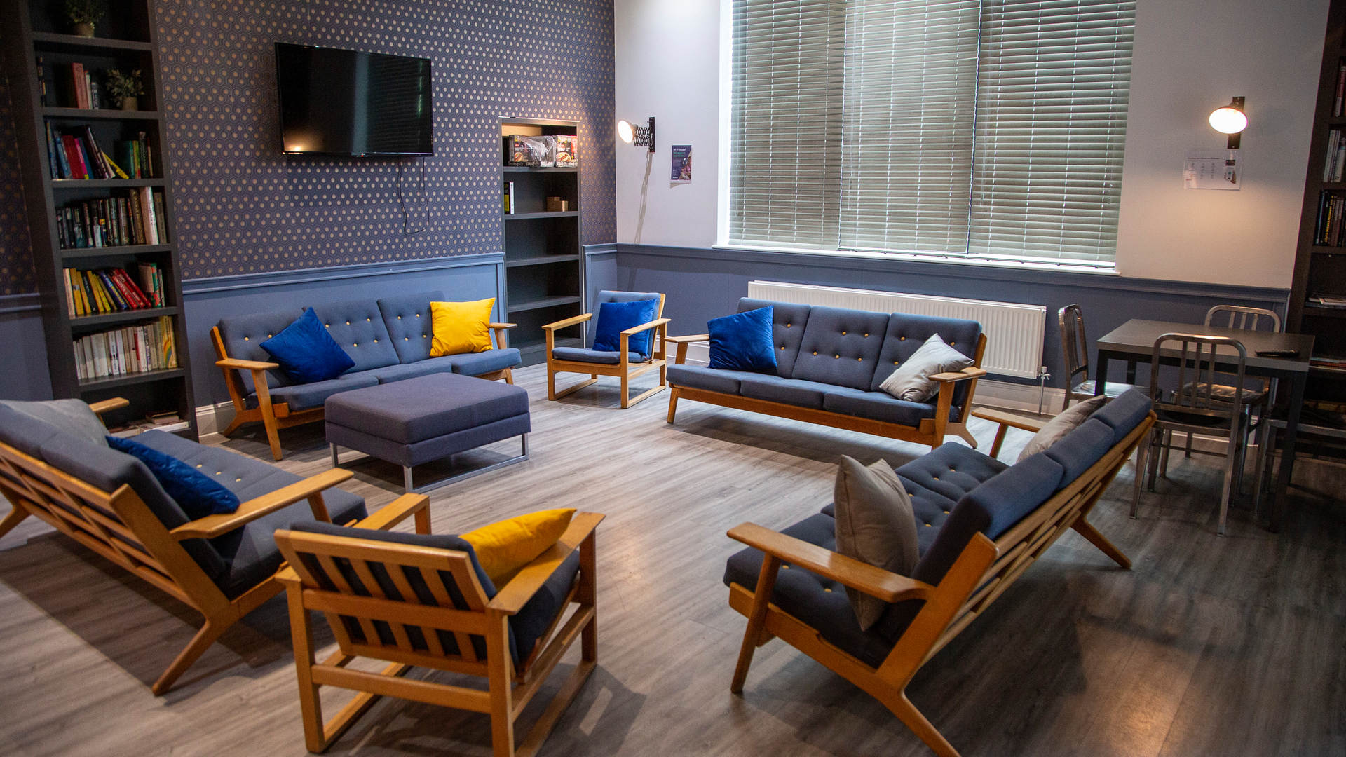 Communal area with sofas and armchairs inside Town Hall Camberwell